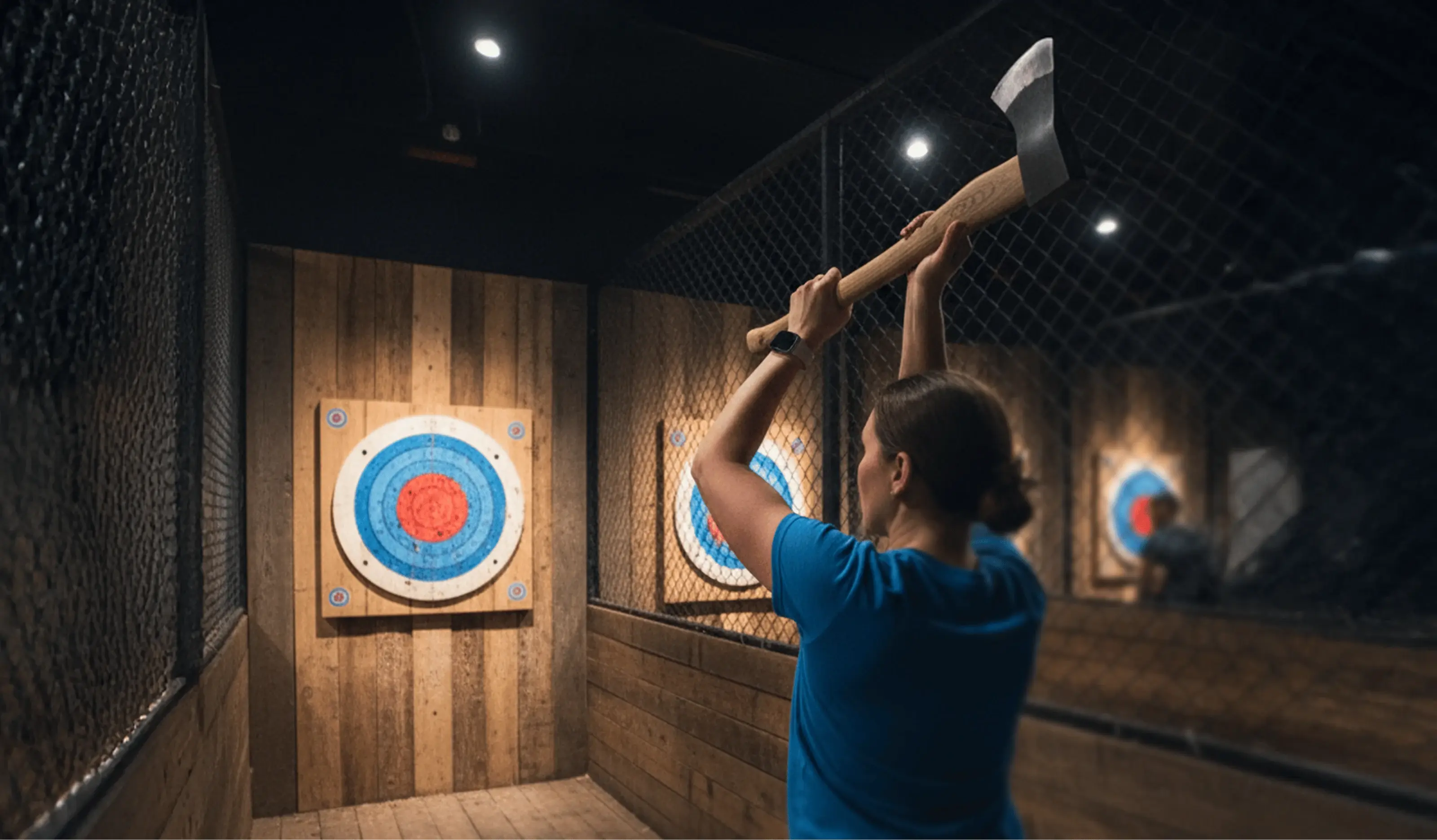A woman throwing axe