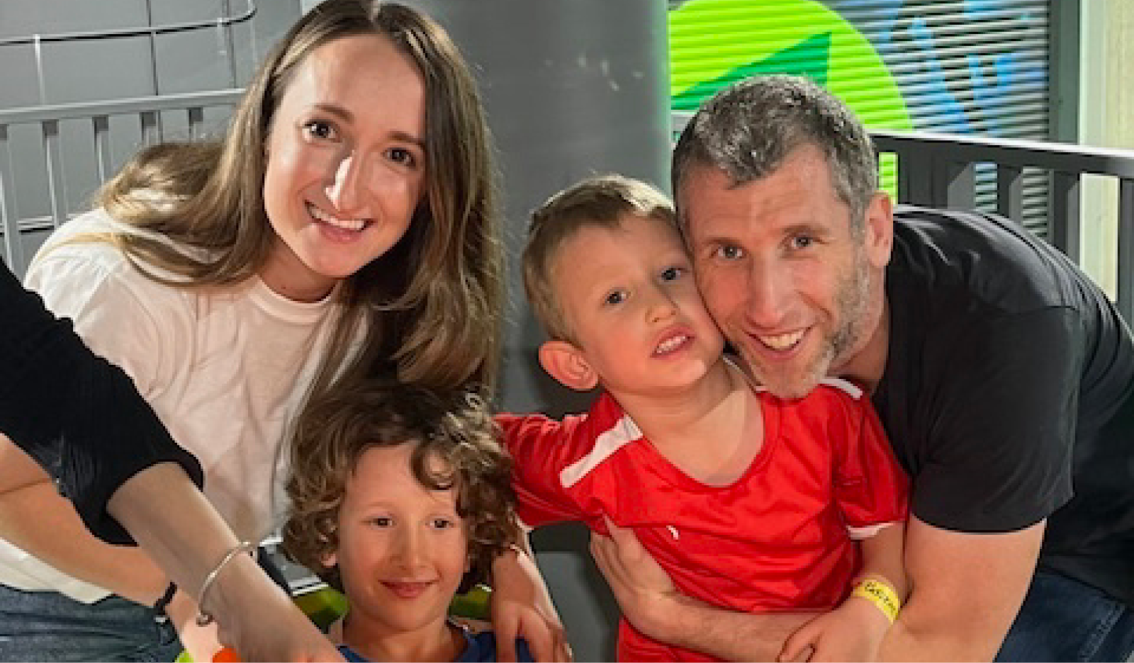 Megan and her family enjoying a birthday party.